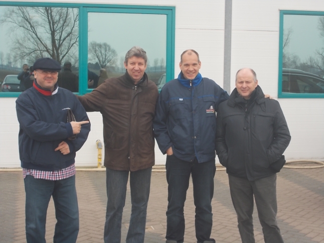 Folrea Sorin, Vincent van de Kerk, Jan Hooymans and Freddy Vandenheede in front of the offices of “Hooymans Company”.